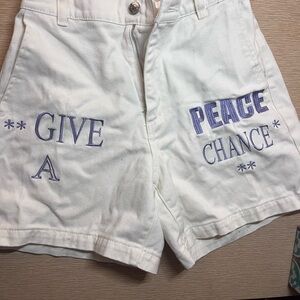 OBEY White Women's Shorts with Periwinkle Text Design